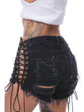 Pantalones cortos con borlas, agujeros y cordones
